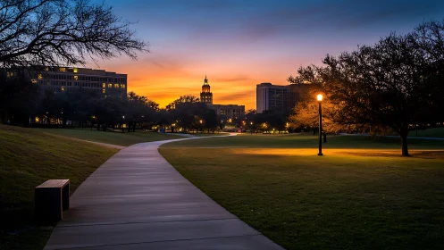 Golden dusk walkway welcomes a calm city park evening