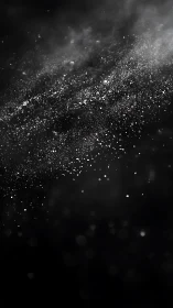 Stellar dust field drifting through deep black void.
