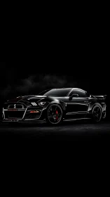Midnight black muscle car glowing in the shadows.