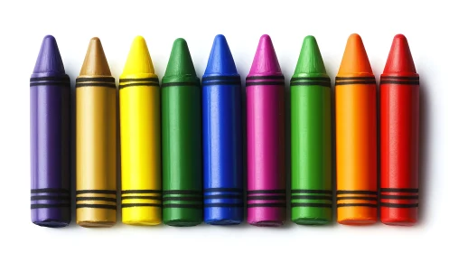 Colorful wax crayons align in precise rainbow spectrum.