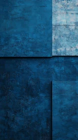 Layered blue concrete panels create a calm urban backdrop