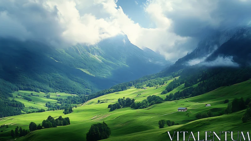 Sunlit alpine valley under brooding cloud wrapped peaks.