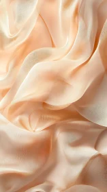 Peach silk folds in soft translucent draped abstraction.