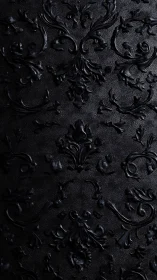 Velvety black damask swirls invite a quietly elegant mood