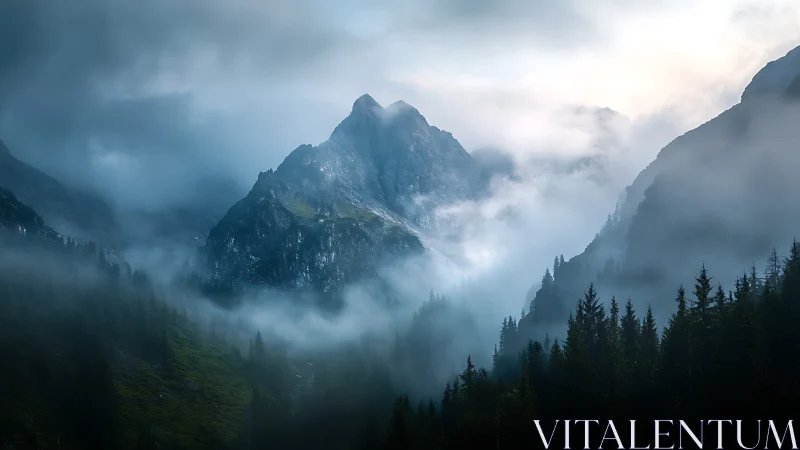 Mountain ridge rises through dense valley fog at dawn light