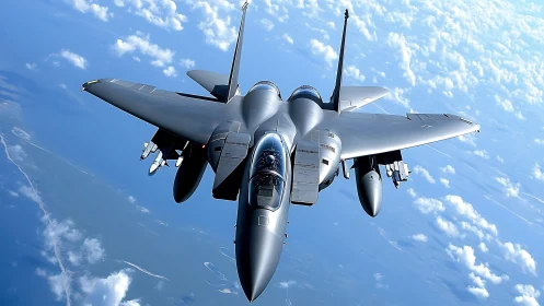 Stealth fighter jet slices through bright blue open sky