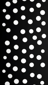 Playful white polka dots dancing on deep black background.