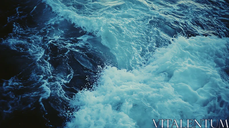 Hydrodynamic turbulence in cyan-toned ocean surface flow.