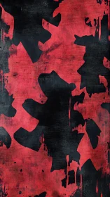 Grunge black splatter shapes cut across a distressed red field