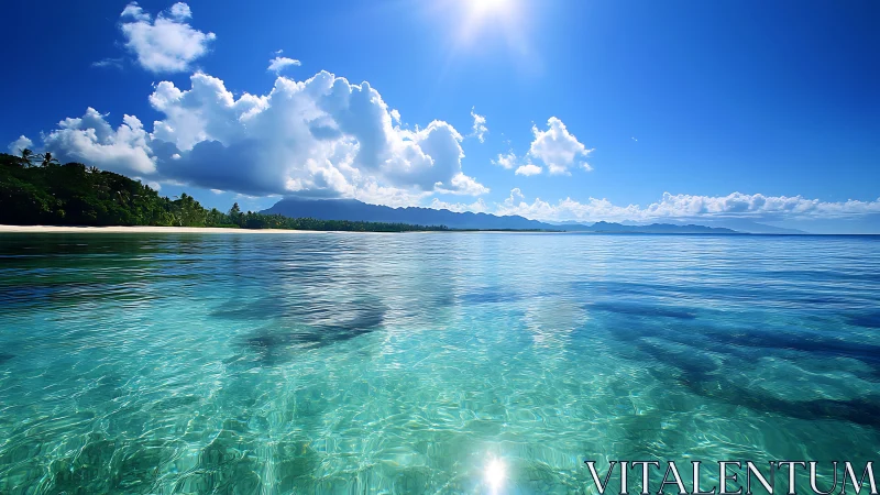 Tropical shoreline with glassy turquoise water and sunlit clouds.