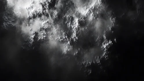 Dramatic Black and White Cloudscape with Textured Shadows.