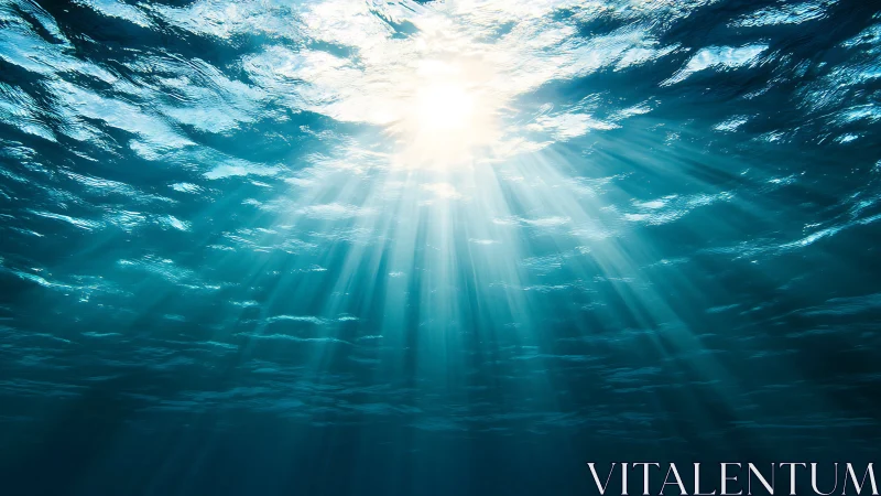 Sunbeams cascade through tranquil blue ocean water