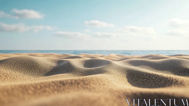 Detailed sand dunes on sunny beach with calm blue sea.