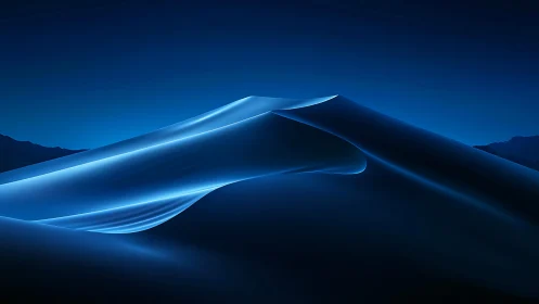 Blue illuminated sand dunes under a clear night sky.