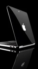 Sleek black laptop stands poised with glowing apple logo