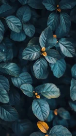 Moody teal foliage with accented ochre leaves, vertical crop.