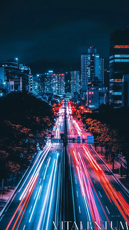 Long-exposure night highway reveals neon urban velocity