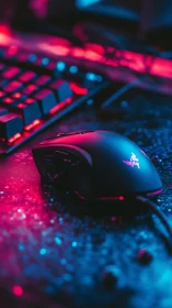 Gaming peripheral setup with neon illumination.
