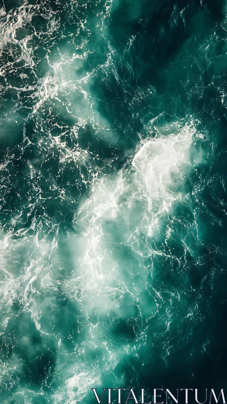 Turquoise ocean currents swirl in foamy, sunlit patterns.