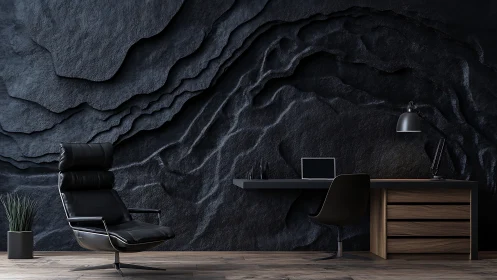 Sculpted slate wall defines monochrome minimalist workspace