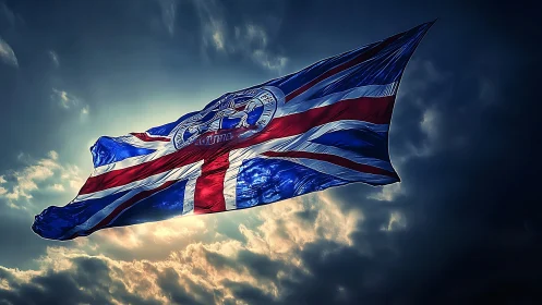 Union Jack variant flag against clouded sky backdrop.
