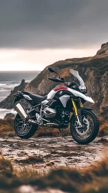 Coastal adventure motorcycle waiting beside rugged cliffs.