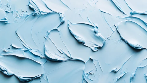 Light blue impasto surface shows smooth sculpted paint ridges
