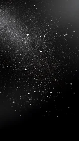 Glittering white dust drifts across a deep black void.