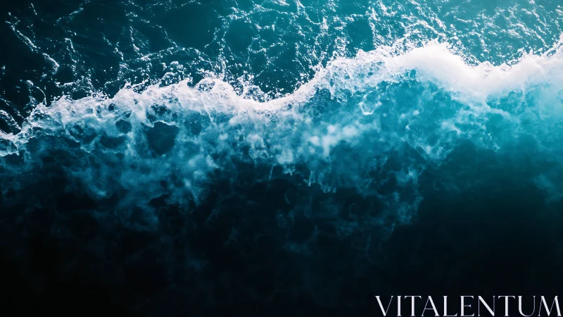Turbulent ocean wave crest with high-contrast aerial perspective.