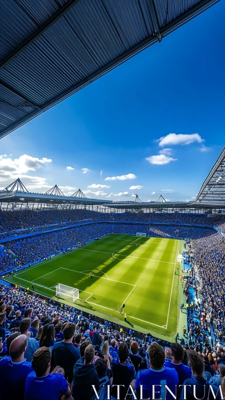Wide-angle stadium crowd under dramatic cantilever roofline.