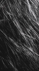 Diagonal white scratch lines on dark rough background.