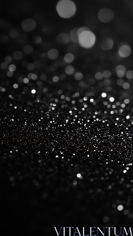 Gentle silver sparkles glowing softly in the dark night.