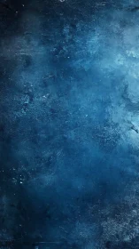 Textured cobalt-blue abstract surface shows layered pigment gradients