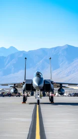Front-on tactical jet on runway with symmetric landing gear alignment