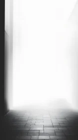 Minimalist corridor dissolving into high-key white void.