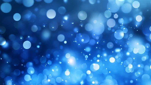 Abstract blue bokeh background with glowing light circles effect.