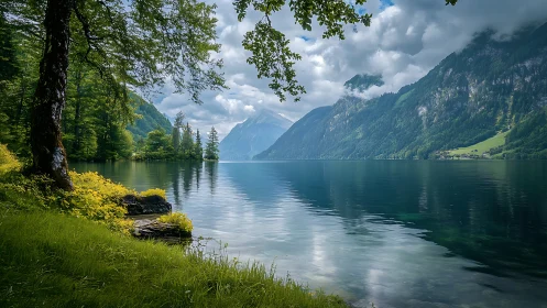 Alpine glacial lake with specular reflections and cloud mantle.