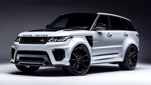 High-contrast Range Rover SUV with aerodynamic kit and gloss black wheels