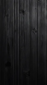 Charcoal-black wooden planks create a sleek vertical backdrop.