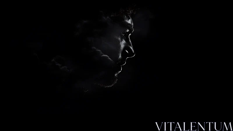 Profile view isolates a male face in controlled low key lighting