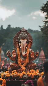Ganesh idol with marigold garlands in ritual outdoor procession.