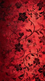 Red textured background shows dark floral vine pattern