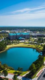 Lakeside campus oasis under bright coastal blue skies.