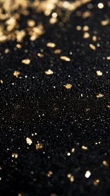 Golden bokeh particles shimmer across deep black surface
