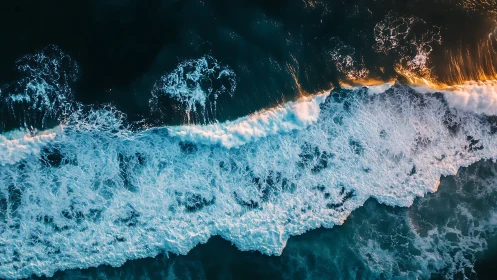 Sunlit breakers sketch glowing calligraphy across midnight sea