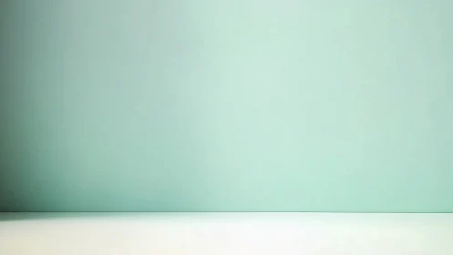 Minimalist mint backdrop with seamless horizontal surface plane