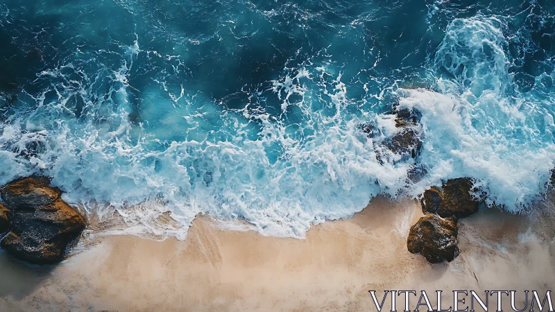 Aerial littoral turbulence over sand and coastal boulders.