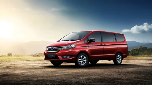 Red multipurpose vehicle is parked on an open dirt landscape