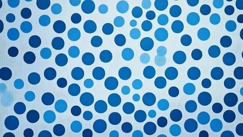 Blue polka dot array forms nonuniform radial density on pale field