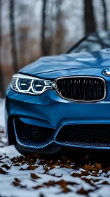 Photorealistic front-quarter detail of blue sport sedan in snow.